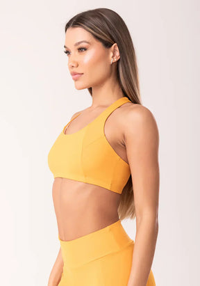 Conjunto Top fitness feminino nadador + Bermuda amarelo com recortes oasis